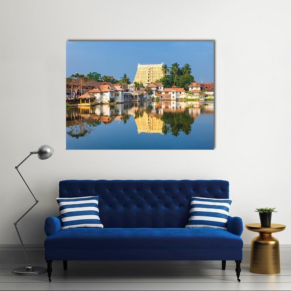 Thiruvananthapuram Temple Pond Reflection Canvas Wall Art in brown, gold and blue, single panel hung on a wall