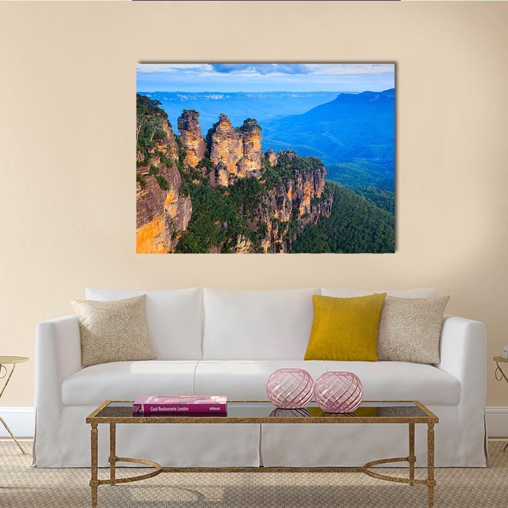 Three Sisters Blue Mountains Canvas Wall Art in brown, green and blue, single panel hung on a wall