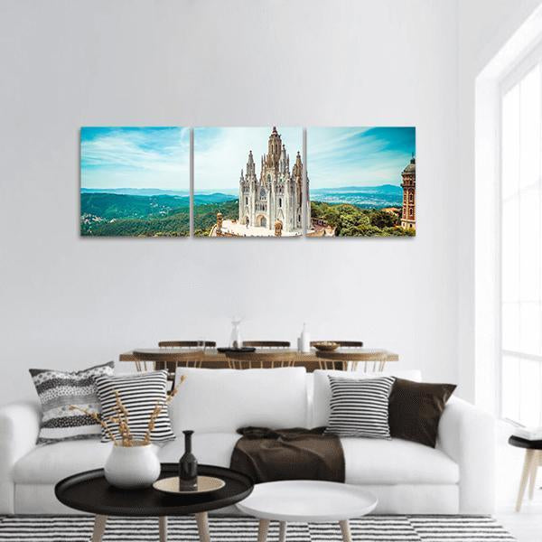 Tibidabo Church in Barcelona Panoramic Canvas Wall Art in white, green and blue, hung on a wall