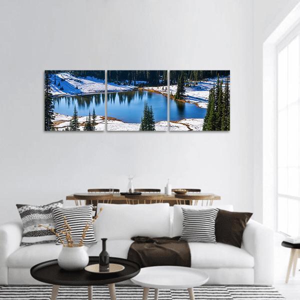 Tipsoo Lake in Winter Panoramic Canvas Wall Art in white and blue, hung on a wall
