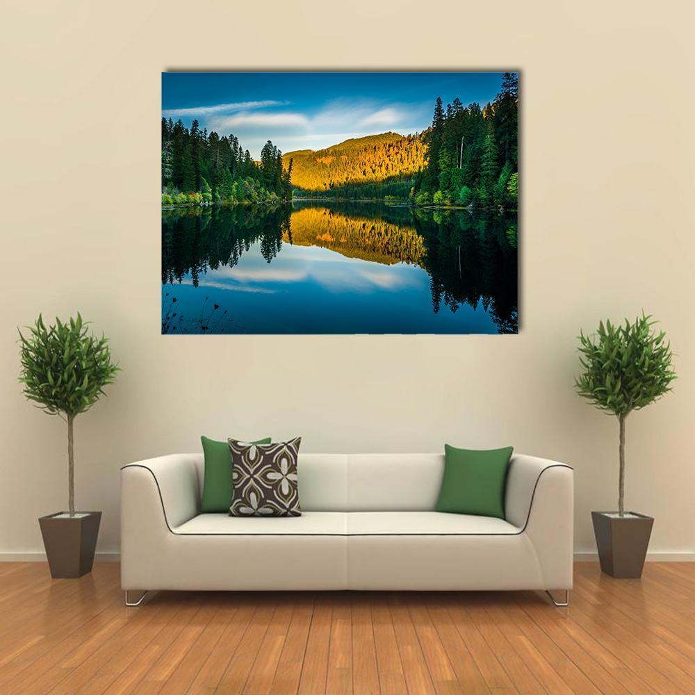 Toketee Lake Oregon Sunlit Peaks Reflection Canvas Wall Art in yellow, green and blue, single panel hung on a wall