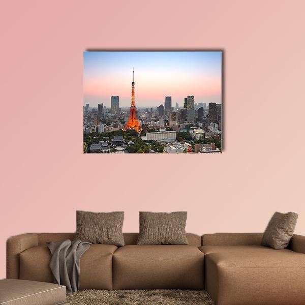 Tokyo Skyline at Sunset Canvas Wall Art in orange, blue and pink, single panel hung on a wall