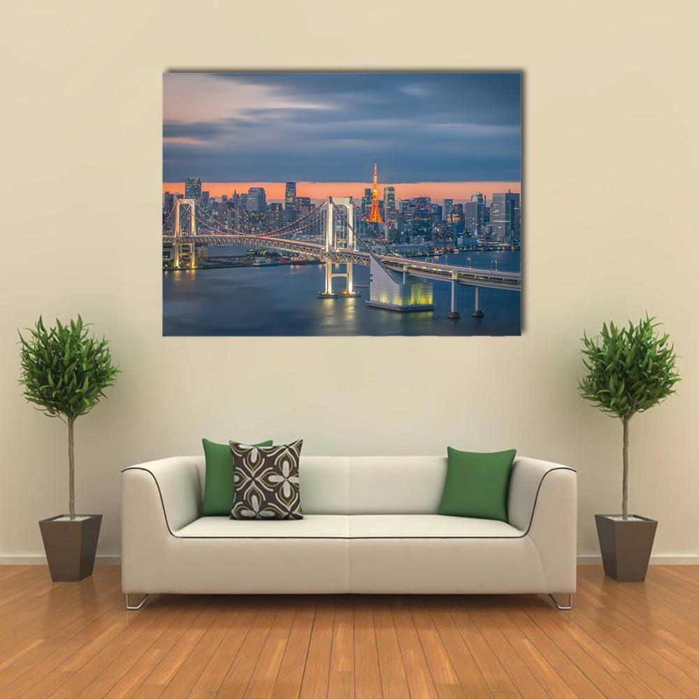 Tokyo Rainbow Bridge at Twilight Canvas Wall Art in gray, orange and blue, single panel hung on a wall