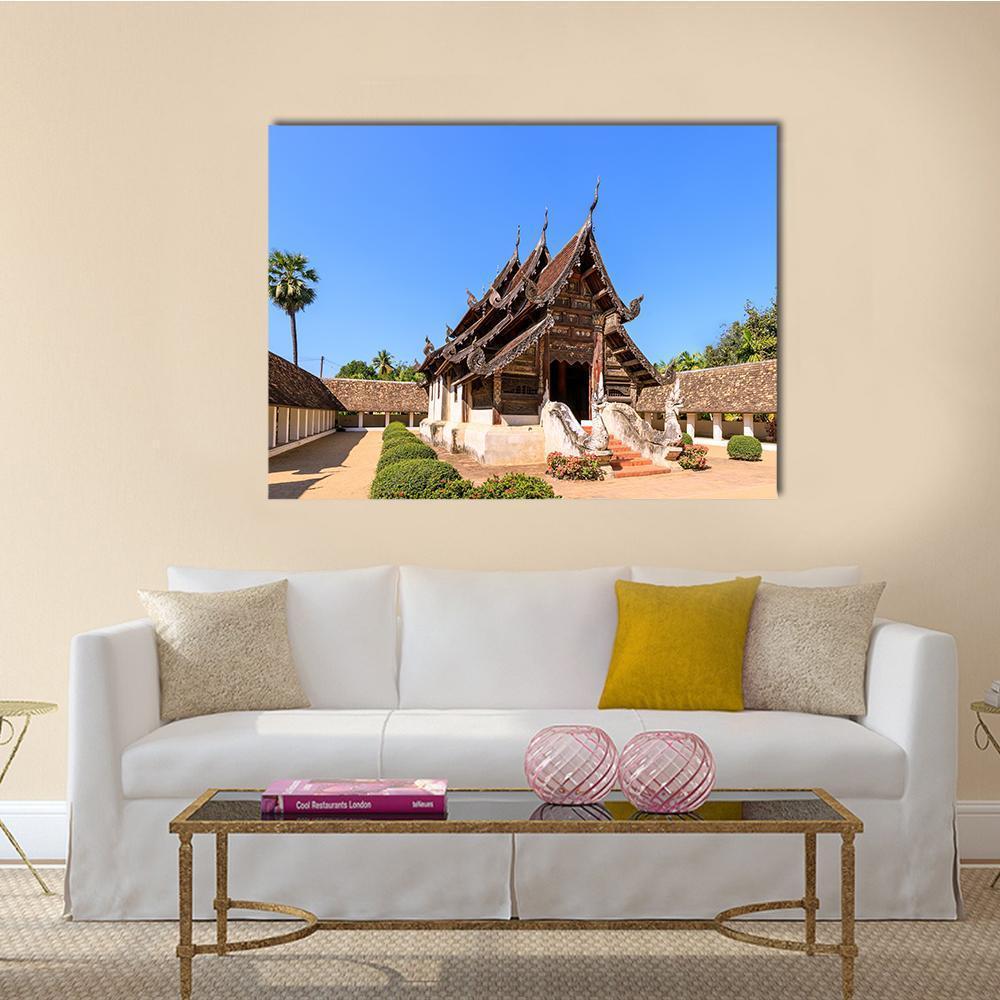 Ton Kwen Temple Thailand Canvas Wall Art in beige, brown and blue, single panel hung on a wall