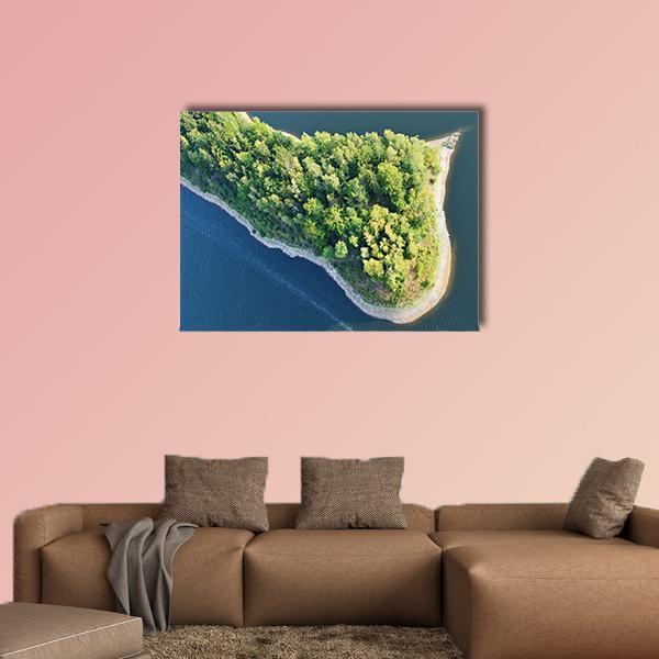 Aerial View of Island Coastline Canvas Wall Art in green and blue, single panel hung on a wall