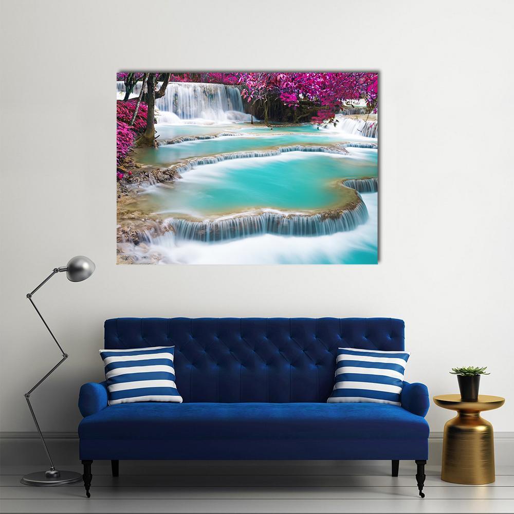 Turquoise Tiered Waterfall with Pink Foliage Canvas Wall Art in white, blue and pink, single panel hung on a wall