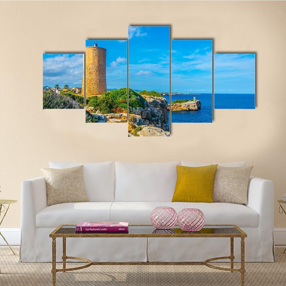 Torre Del Serral Dels Falcons Canvas Wall Art in beige, green and blue, 5 panel Star layout hung on a wall