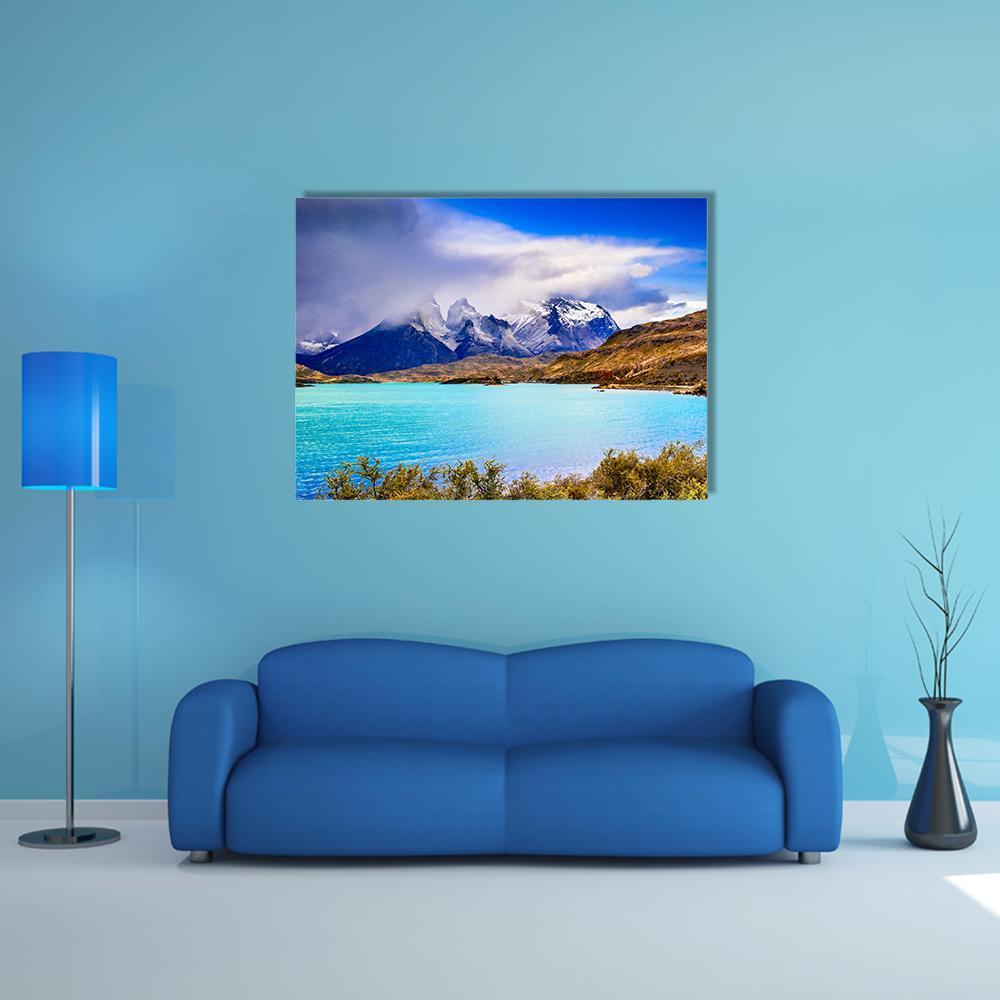 Torres Del Paine Turquoise Lake and Snow-capped Peaks Canvas Wall Art in white, brown and blue, single panel hung on a wall
