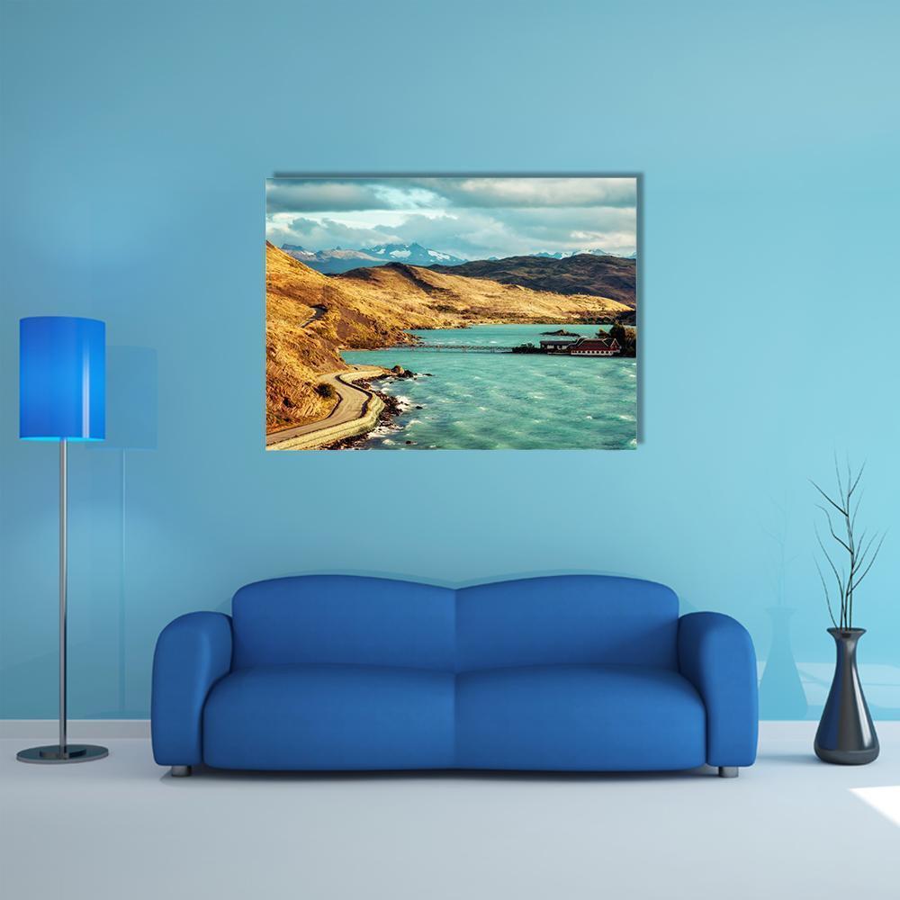 Torres Del Paine Lake and Mountains Canvas Wall Art in brown, yellow and blue, single panel hung on a wall