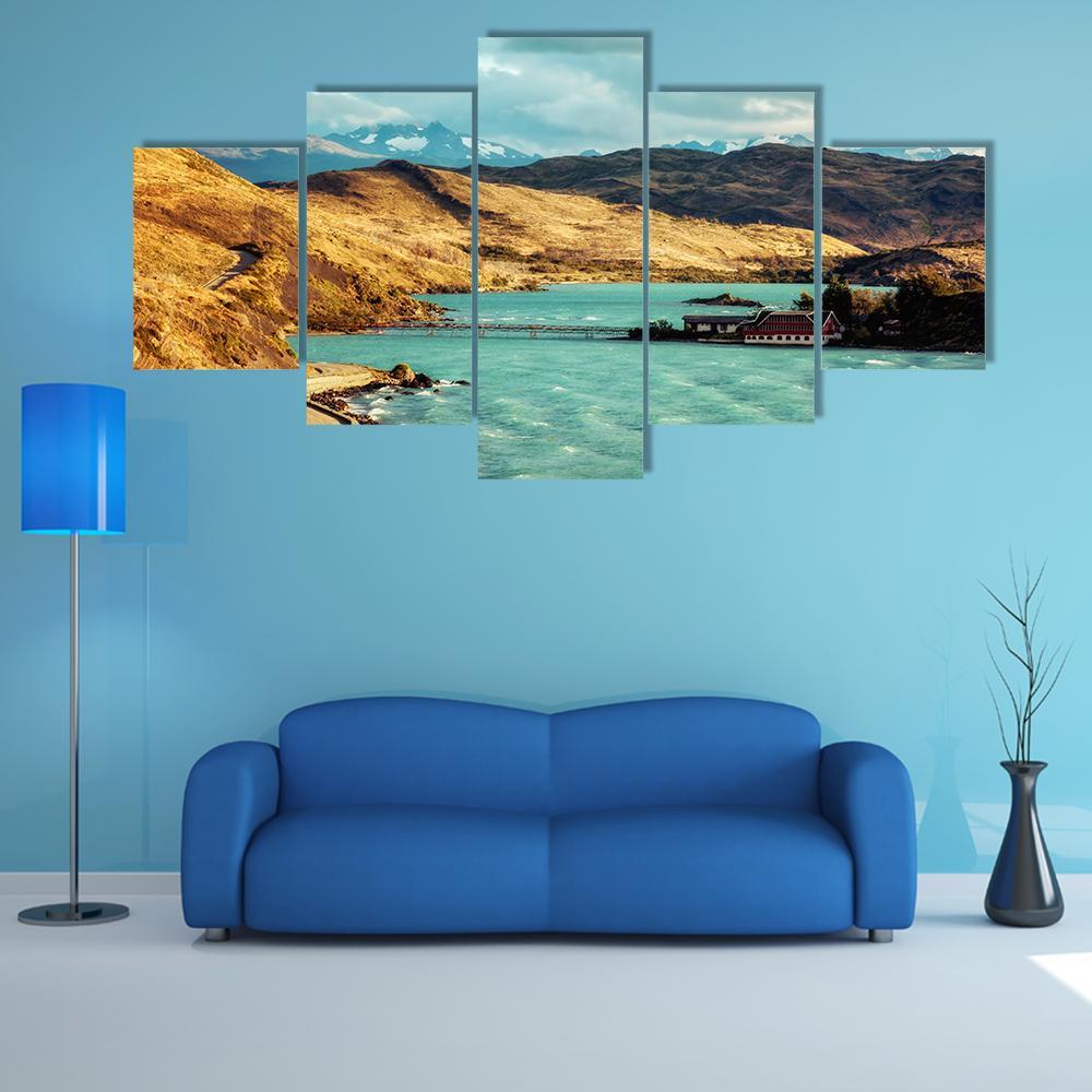 Torres Del Paine Lake and Mountains Canvas Wall Art in brown, yellow and blue, 5 panel Star layout hung on a wall