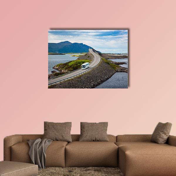 Tourist Bus on Atlantic Road Canvas Wall Art in gray, green and blue, single panel hung on a wall