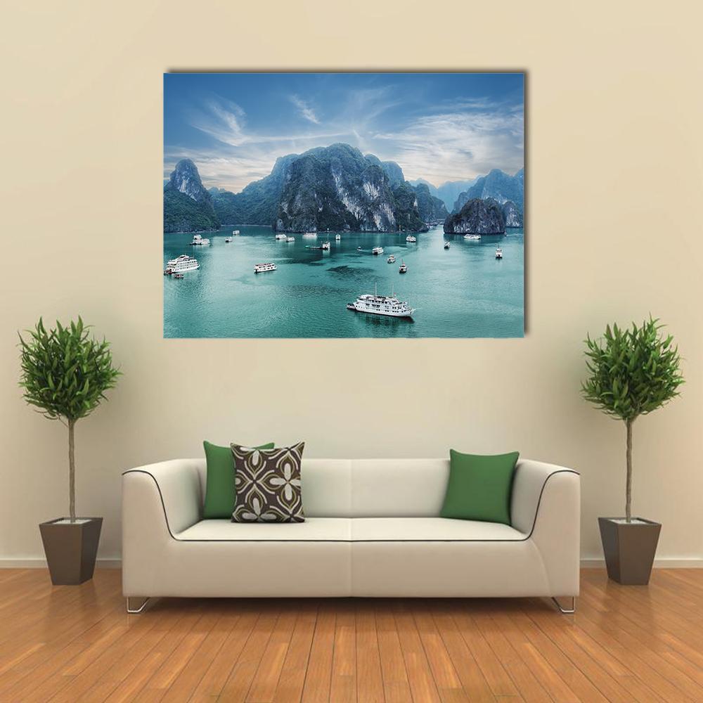 Tourist Junks Among Limestone Karsts Canvas Wall Art in gray, green and blue, single panel hung on a wall