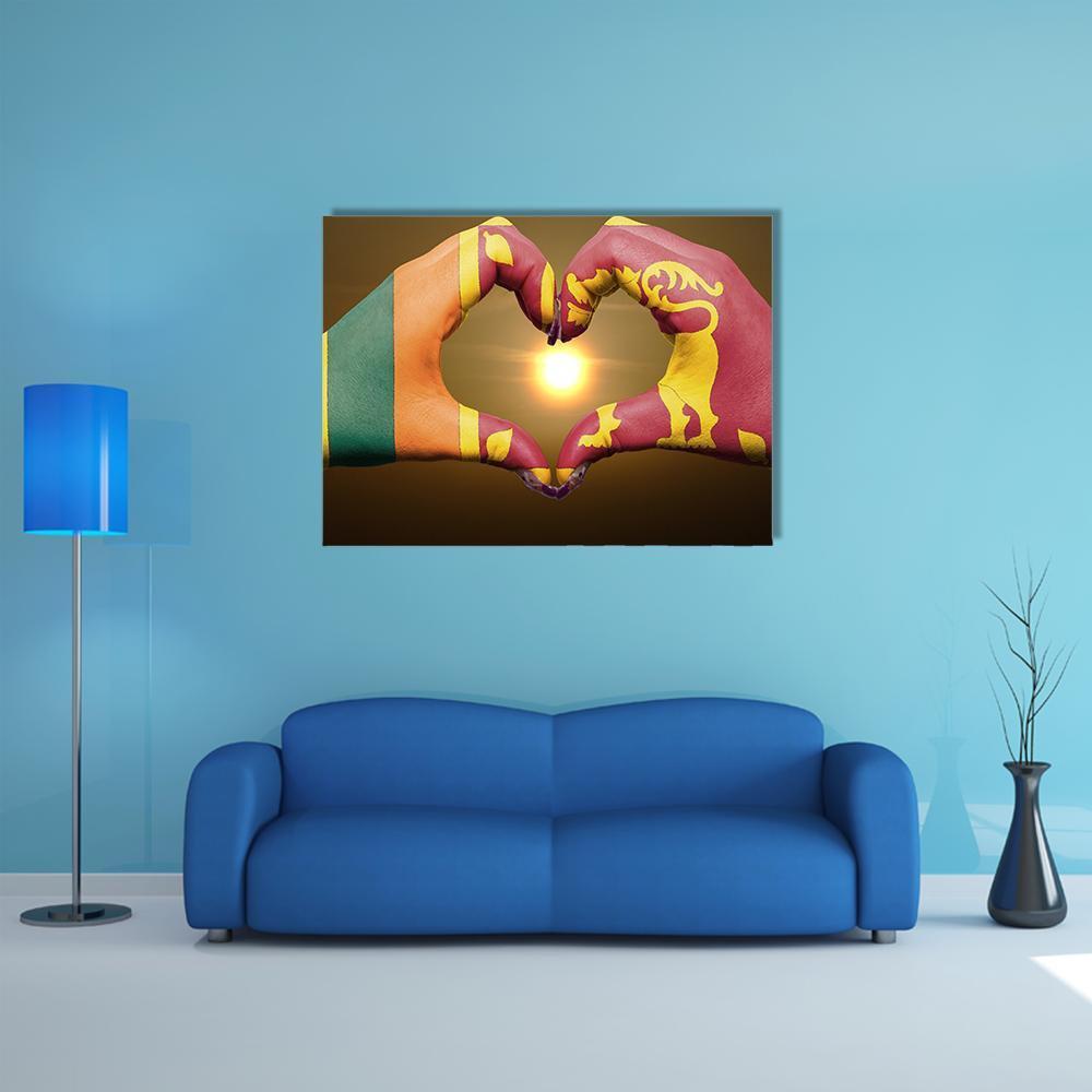 Hands Forming Heart with Sri Lanka Flag Canvas Wall Art in red, yellow and green, single panel hung on a wall