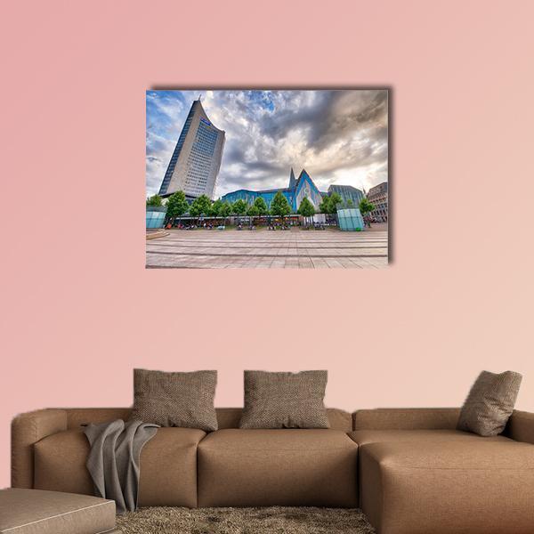 Tourists in Modern City Square with Blue Dome Canvas Wall Art in gray, beige and blue, single panel hung on a wall