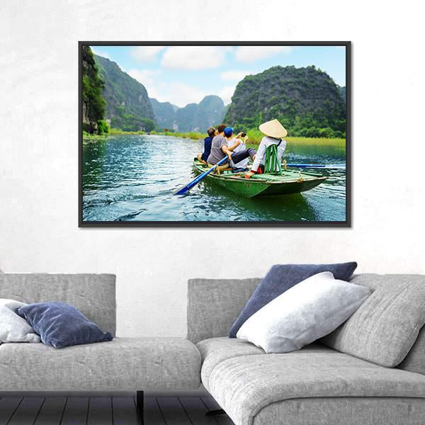 Tourists In Boat Along Ngo Dong River Canvas Wall Art