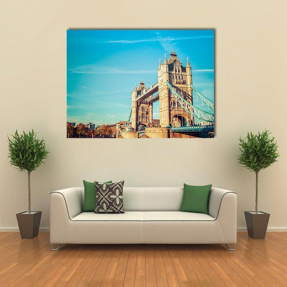 Tower Bridge London Canvas Wall Art in beige, brown and blue, single panel hung on a wall