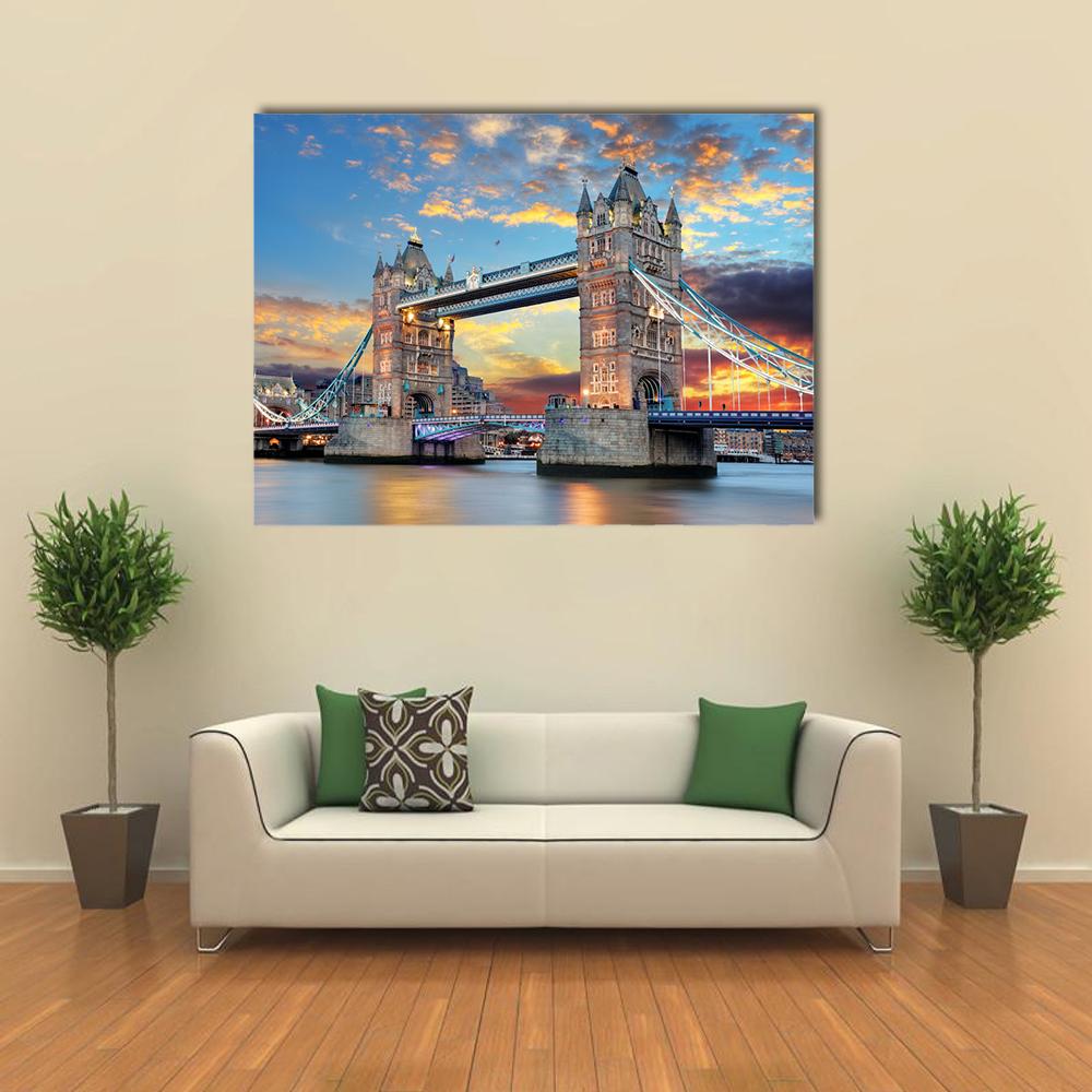 Tower Bridge London at Sunset Canvas Wall Art in orange, yellow and blue, single panel hung on a wall