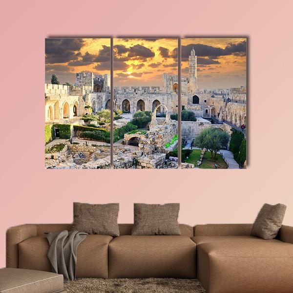 Tower of David at Sunset, Jerusalem Palestine Canvas Wall Art in beige, orange and yellow, single panel hung on a wall