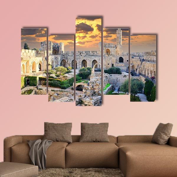 Tower of David at Sunset, Jerusalem Palestine Canvas Wall Art in beige, orange and yellow, single panel hung on a wall