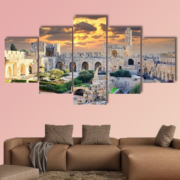 Tower of David at Sunset, Jerusalem Palestine Canvas Wall Art in beige, orange and yellow, single panel hung on a wall
