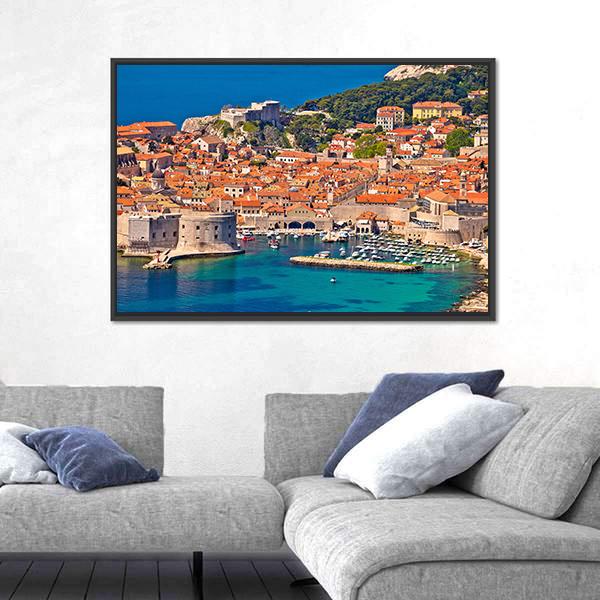 Dubrovnik Harbor View with Red-tiled Roofs Canvas Wall Art in red, orange and blue, framed canvas, product view on a white background