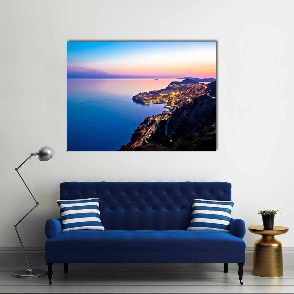 Dubrovnik Sunset Over Coastal City Canvas Wall Art in orange, blue and purple, single panel hung on a wall