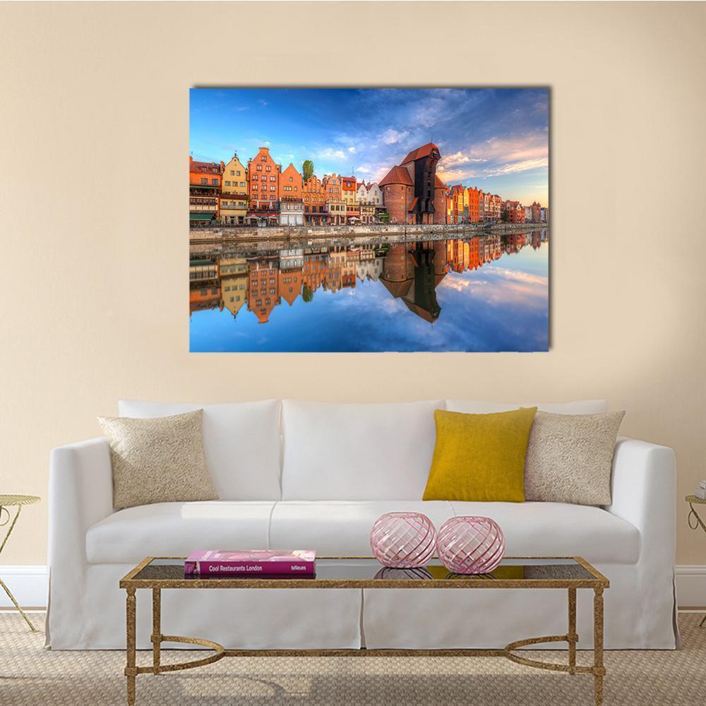 Gdansk Reflected in Motlawa River Canvas Wall Art in brown, orange and blue, single panel hung on a wall