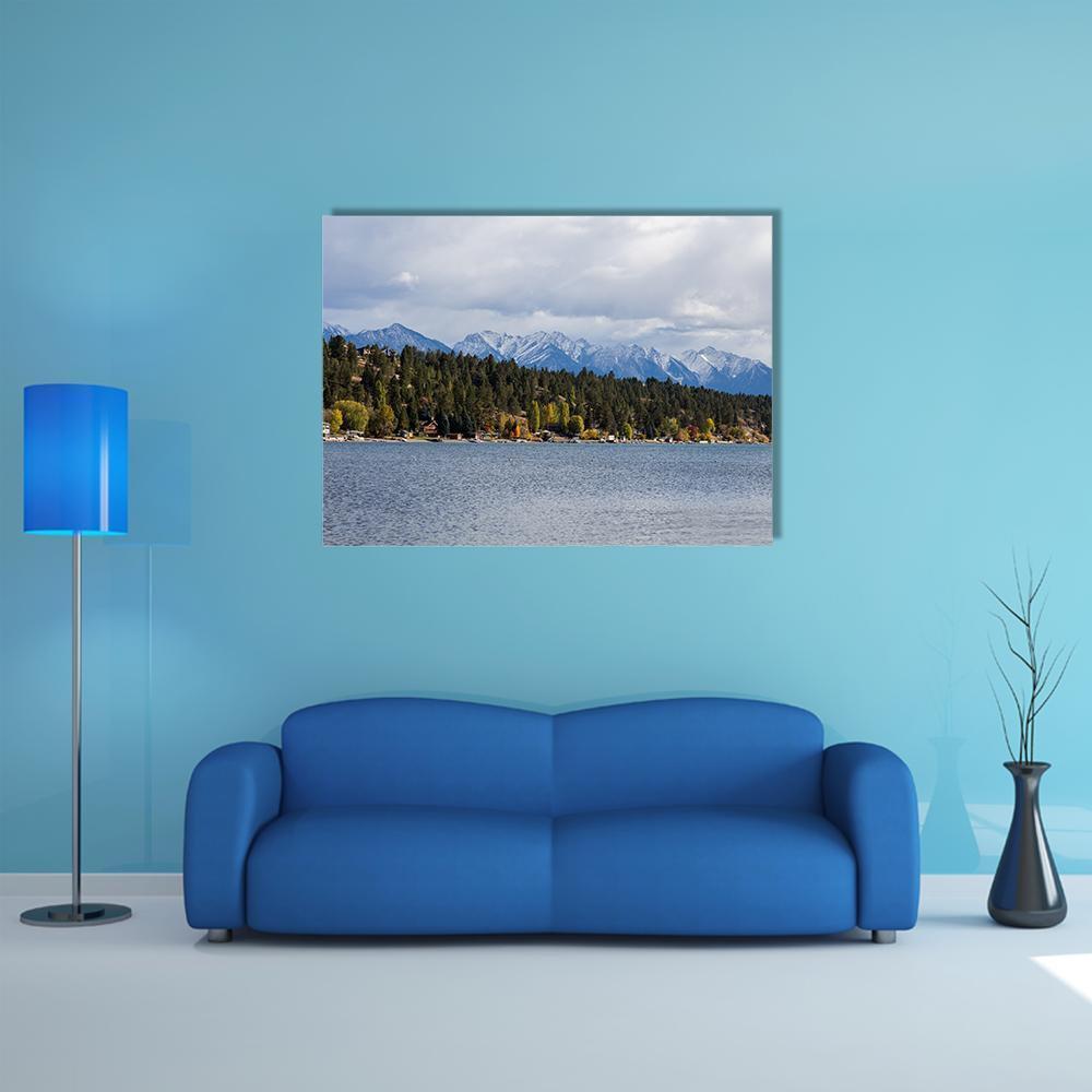 Invermere Lake and Mountains Canvas Wall Art in white, green and blue, single panel hung on a wall