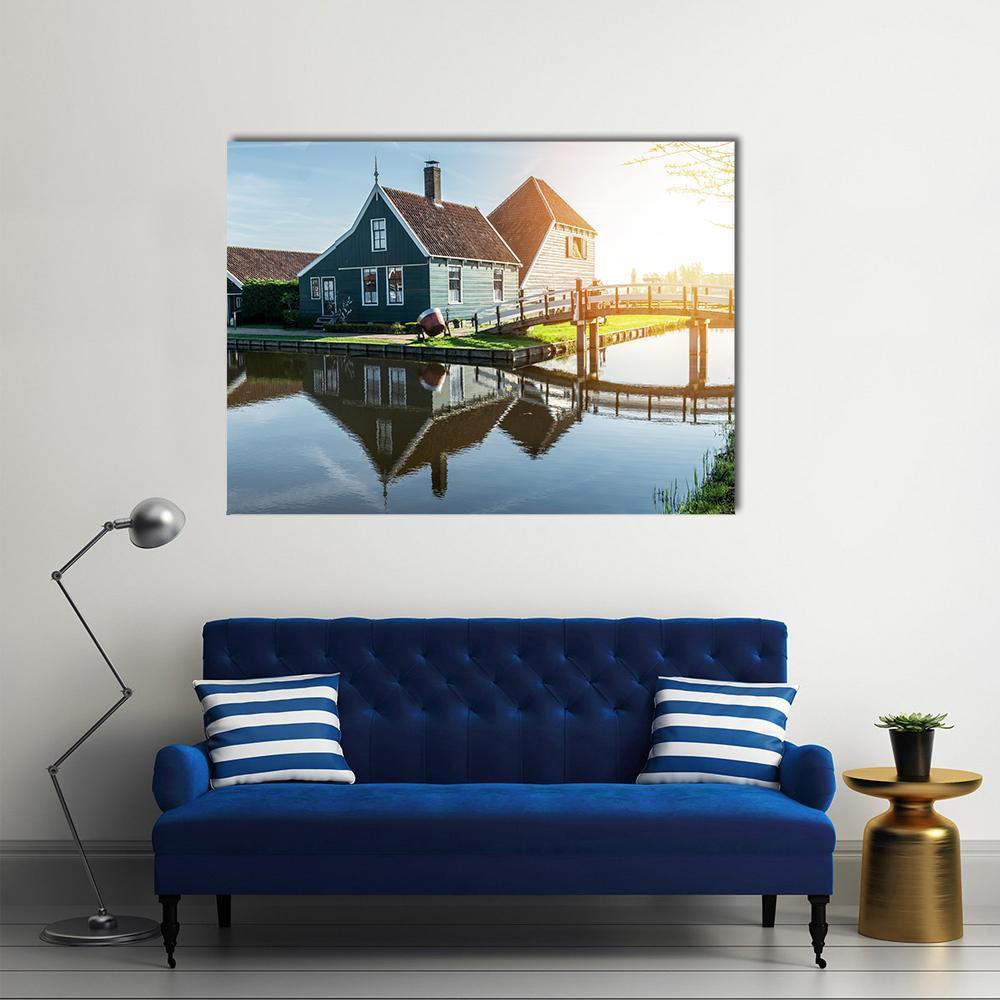 Dutch Canal Houses with Wooden Bridge Canvas Wall Art in brown, green and blue, single panel hung on a wall