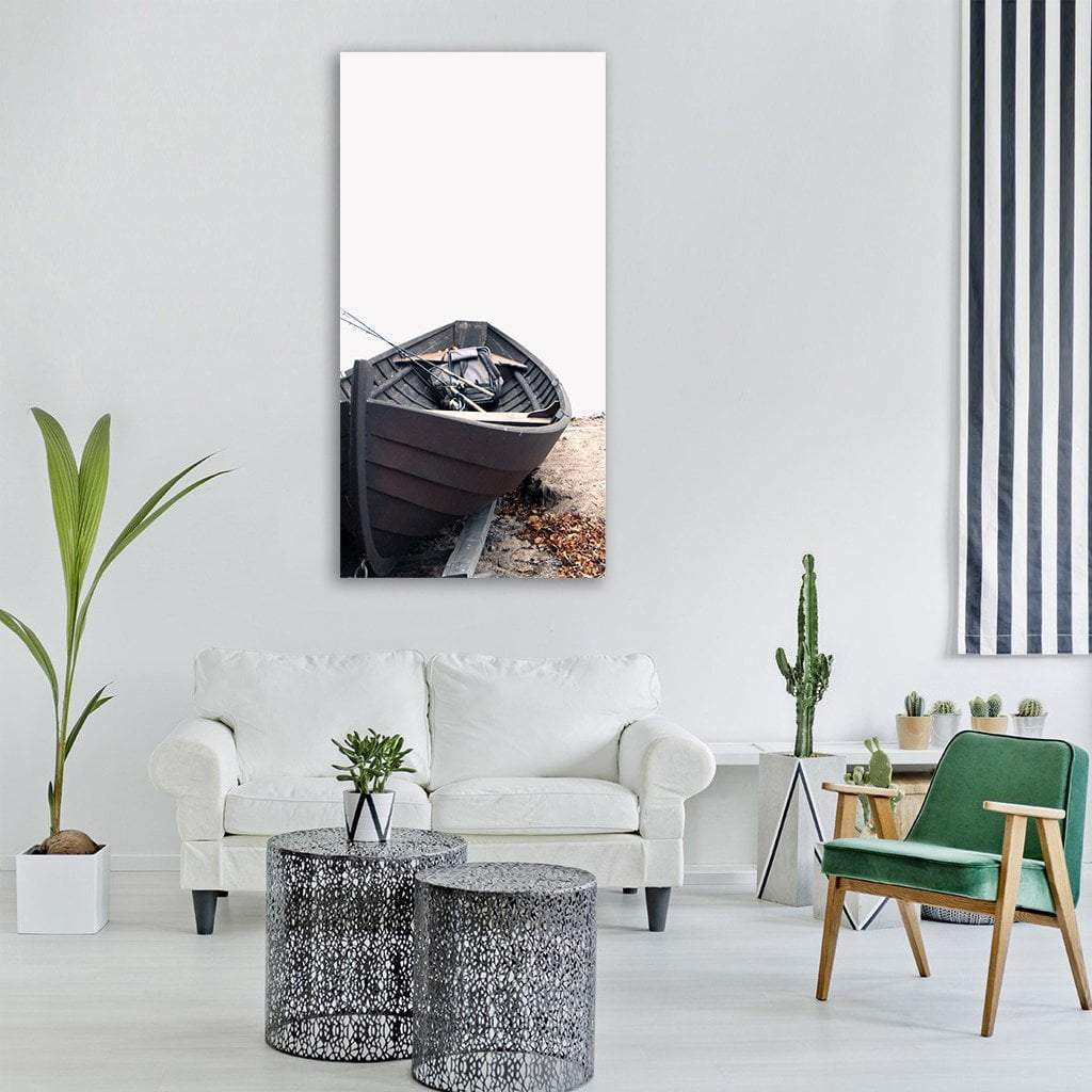 Traditional Wooden Rowboat on Beach Vertical Canvas Wall Art in black, white and brown, single vertical panel hung on a wall