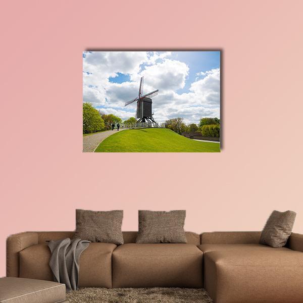 Traditional Wooden Windmill in Bruges Canvas Wall Art in white, green and blue, single panel hung on a wall