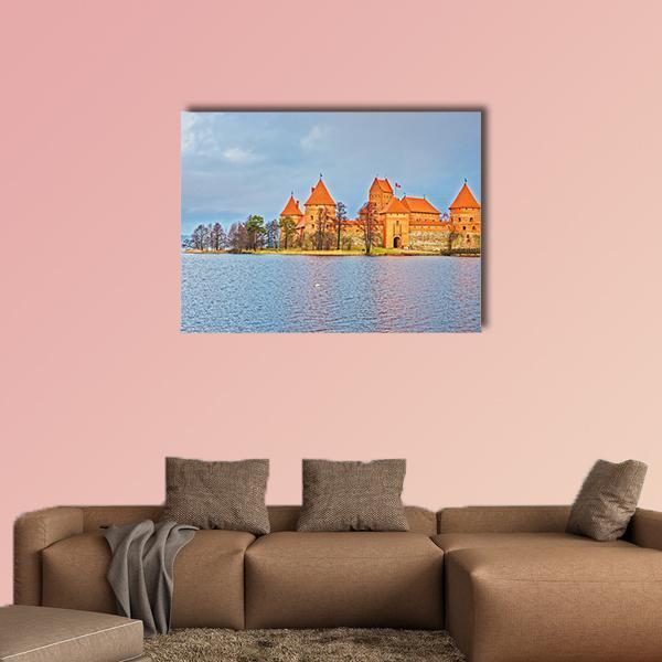 Trakai Island Castle at Galve Lake Canvas Wall Art in gray, orange and blue, single panel hung on a wall