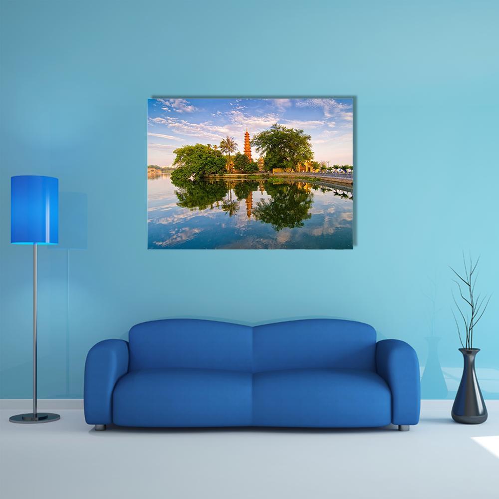 Tran Quoc Pagoda in Hanoi Canvas Wall Art in orange, green and blue, single panel hung on a wall