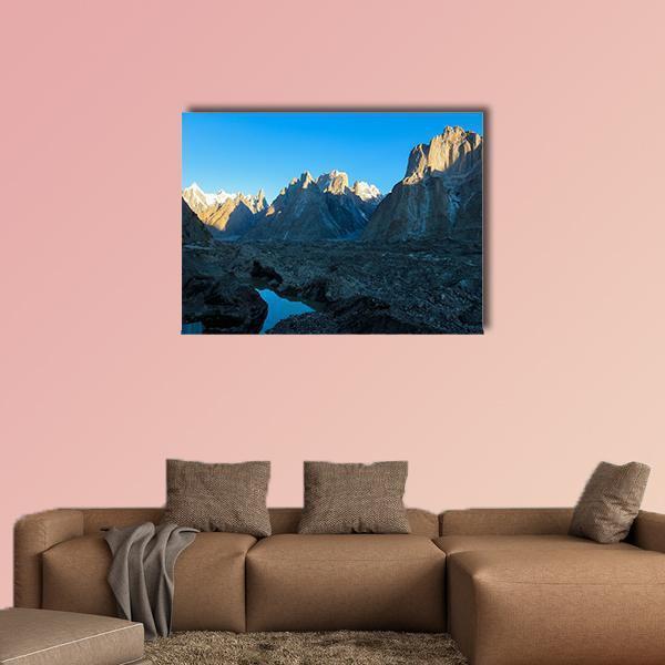 Trango Towers and Baltoro Glacier Karakorum Pakistan Canvas Wall Art in gray, brown and blue, single panel hung on a wall