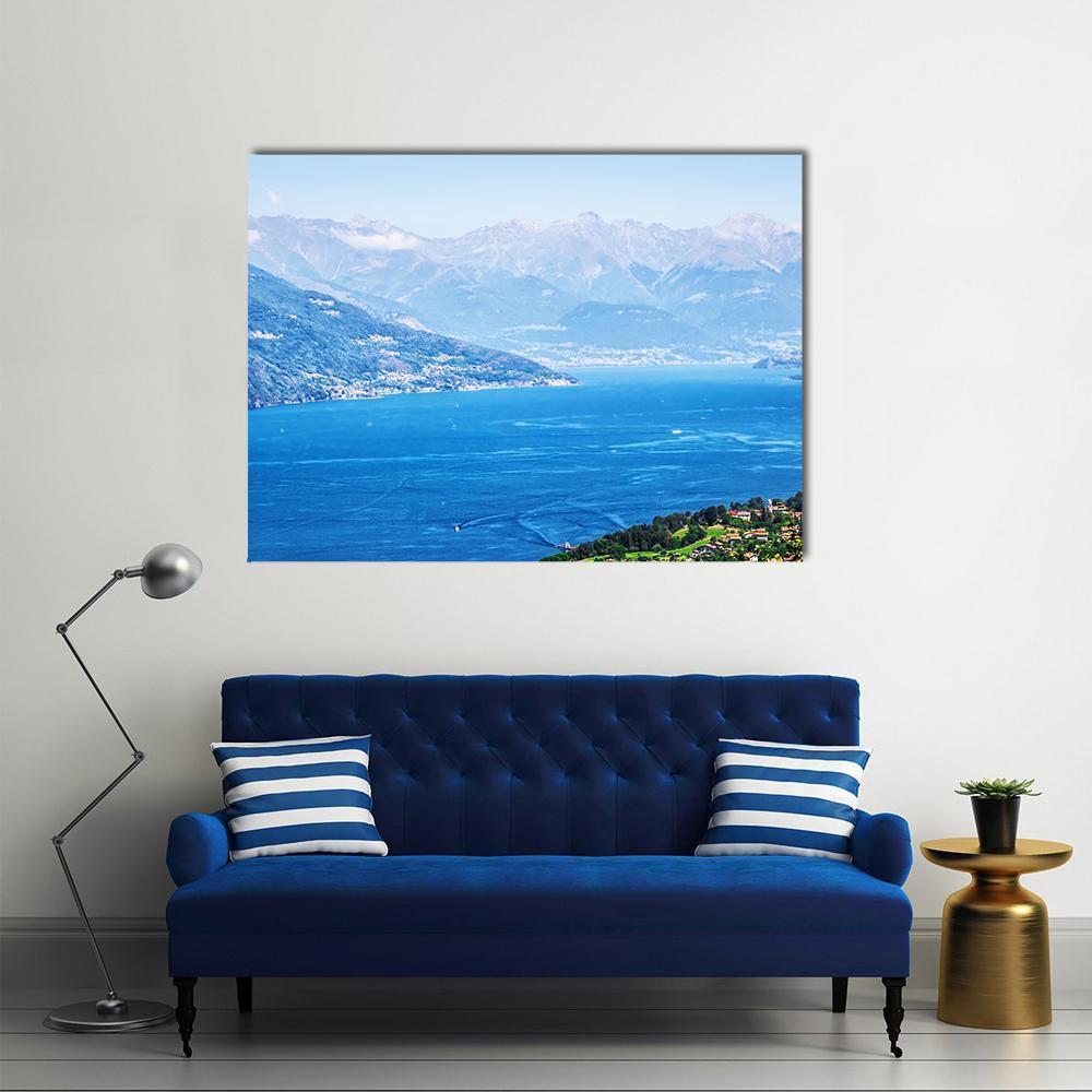 Tranquil Lake Como and the Alps Canvas Wall Art in white and blue, single panel hung on a wall