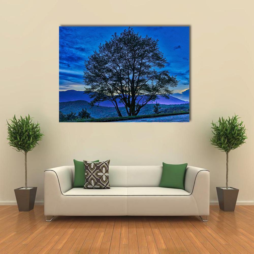 Tree on Blue Ridge Parkway Canvas Wall Art in black and blue, single panel hung on a wall