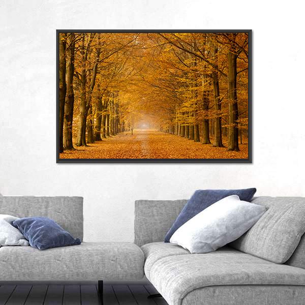 Trees Alongside Road in Autumn Canvas Wall Art in brown, orange and yellow, framed canvas, product view on a white background