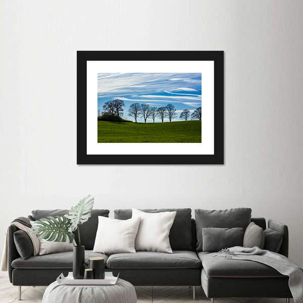 Trees Silhouetted Against A Blue Sky Canvas Wall Art-1 Piece-Framed Print-20" x 16"-Tiaracle