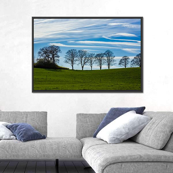 Trees Silhouetted Against A Blue Sky Canvas Wall Art-1 Piece-Floating Frame-24" x 16"-Tiaracle
