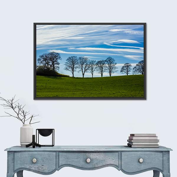 Trees Silhouetted Against A Blue Sky Canvas Wall Art-3 Horizontal-Gallery Wrap-25" x 16"-Tiaracle