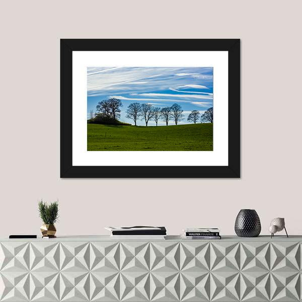 Trees Silhouetted Against A Blue Sky Canvas Wall Art-3 Horizontal-Gallery Wrap-25" x 16"-Tiaracle
