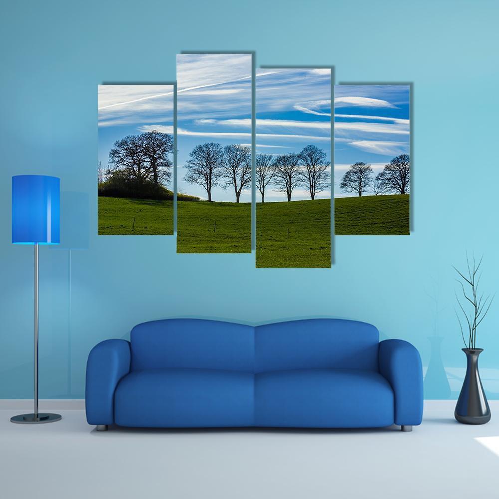 Trees Silhouetted Against A Blue Sky Canvas Wall Art-4 Pop-Gallery Wrap-50" x 32"-Tiaracle
