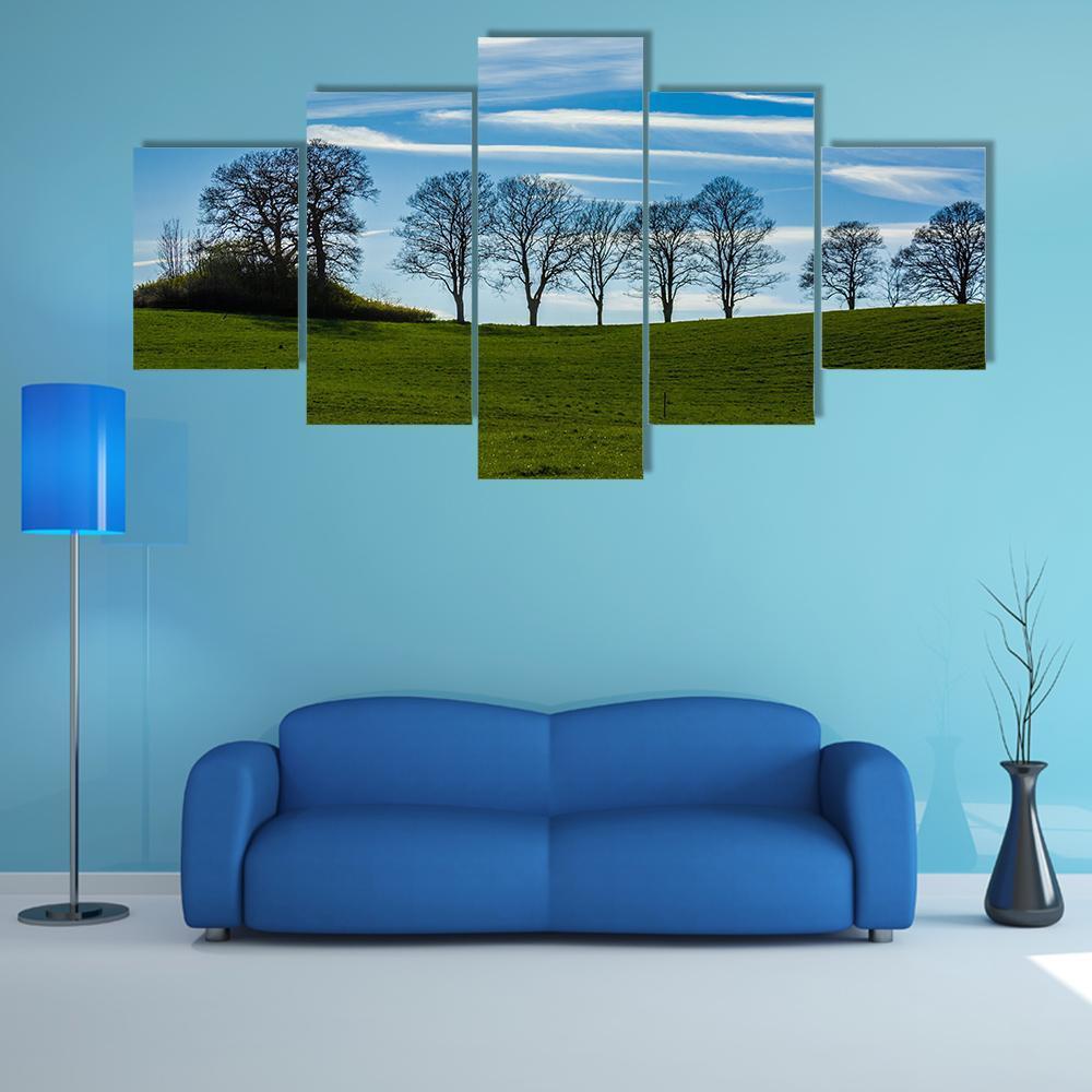 Trees Silhouetted Against A Blue Sky Canvas Wall Art-5 Star-Gallery Wrap-62" x 32"-Tiaracle