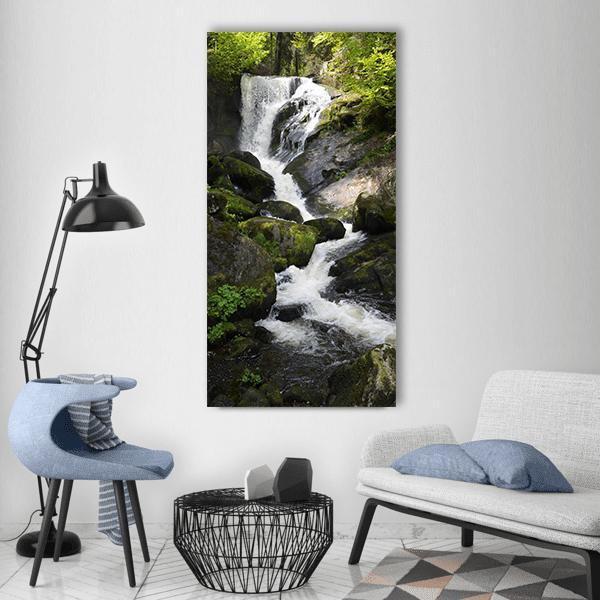 Triberg Waterfall in Germany Vertical Canvas Wall Art in white, gray and green, single vertical panel hung on a wall