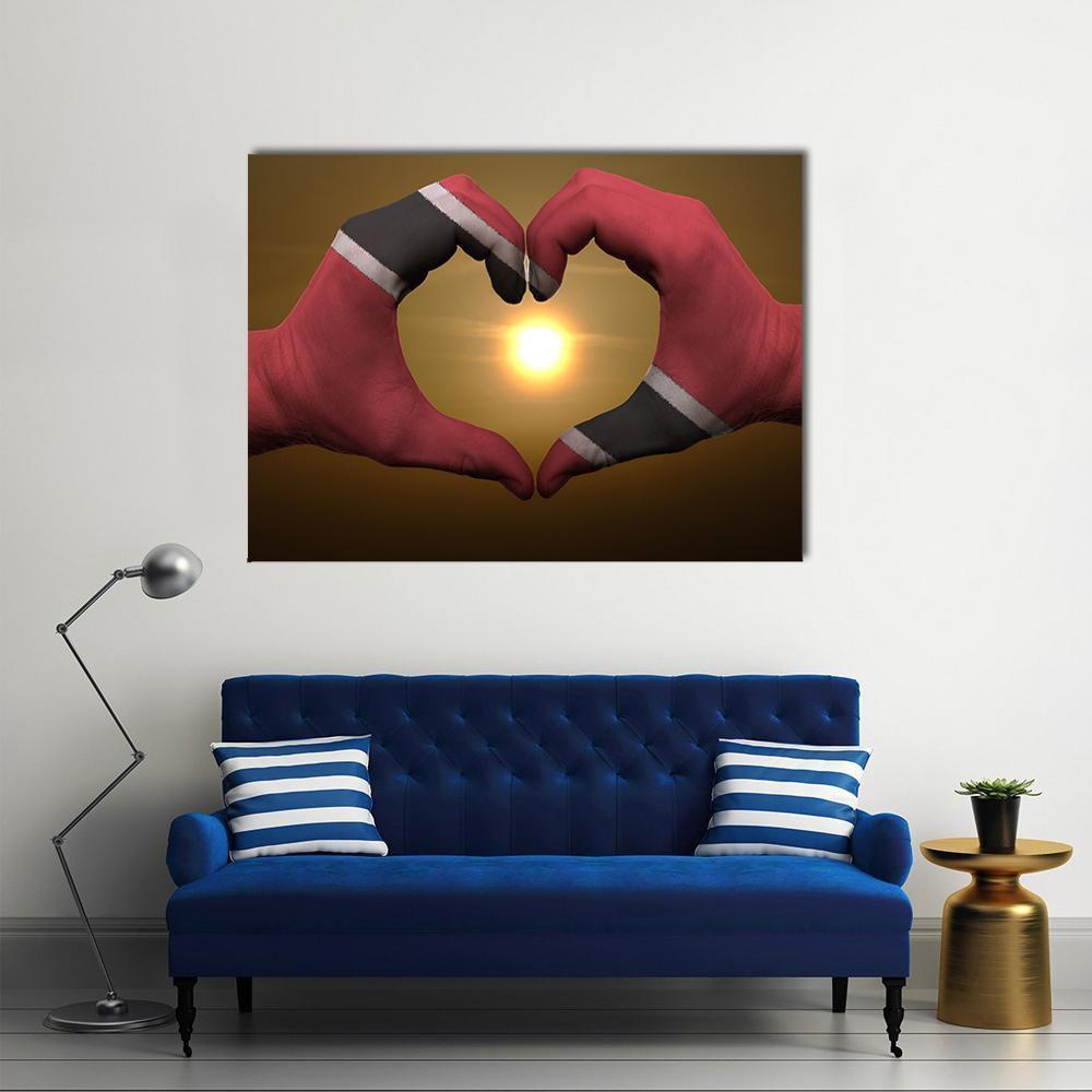 Trinidad and Tobago Flag on Hands Canvas Wall Art in black, brown and red, single panel hung on a wall