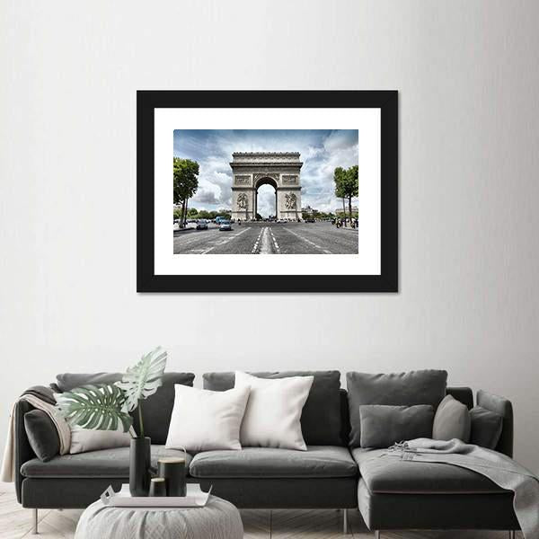 Arc De Triomphe on Paris Avenue Canvas Wall Art in white, gray and blue, hung on a wall