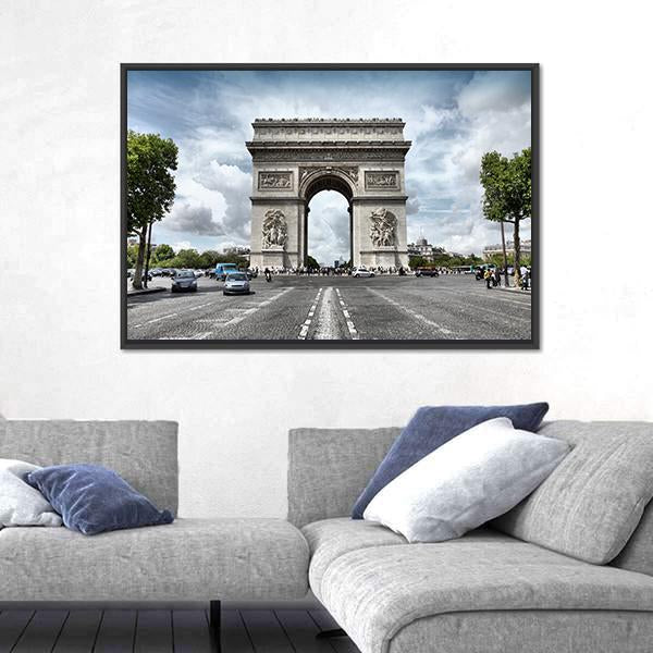Arc De Triomphe on Paris Avenue Canvas Wall Art in white, gray and blue, hung on a wall