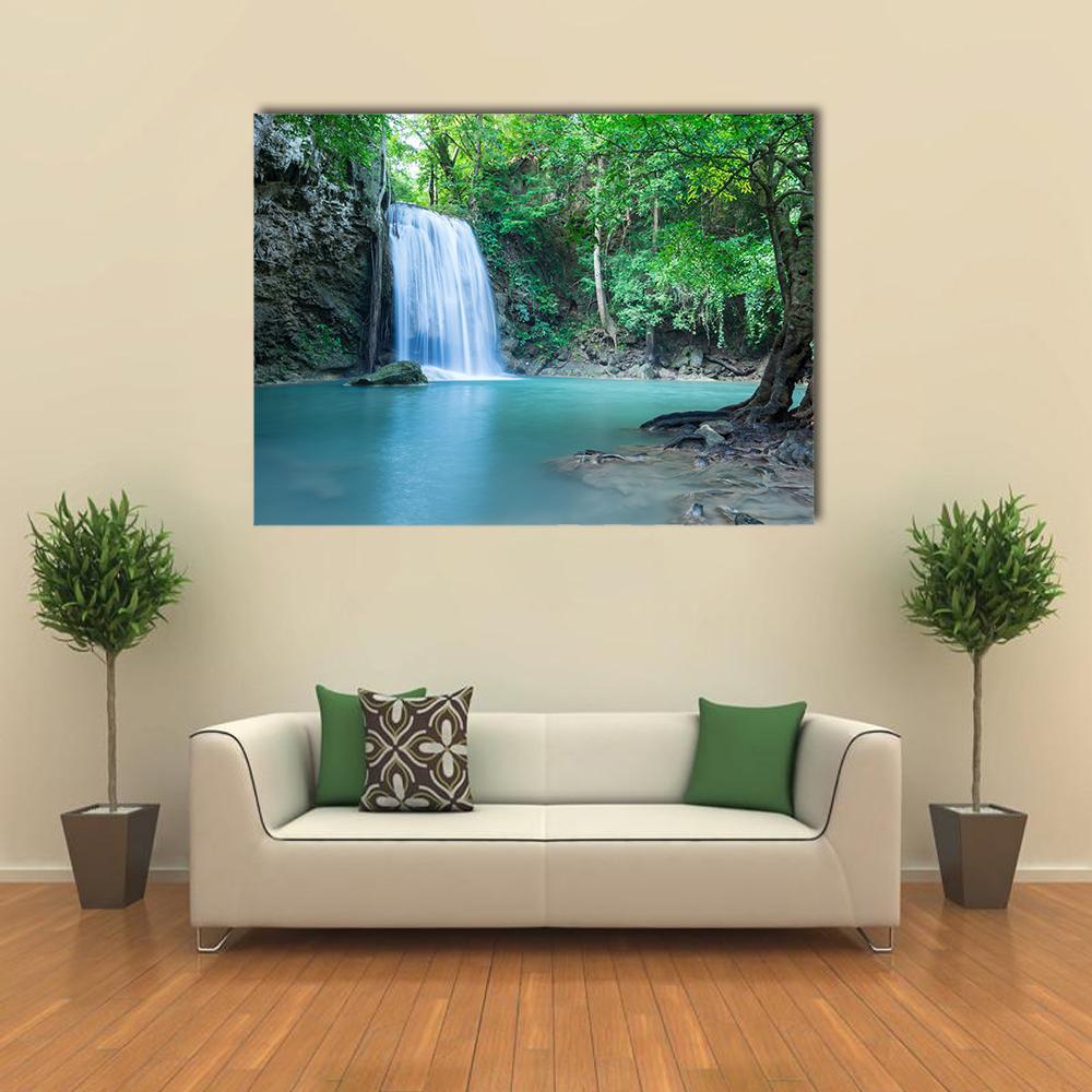 Tropical Erawan Waterfall Canvas Wall Art in gray, green and blue, single panel hung on a wall