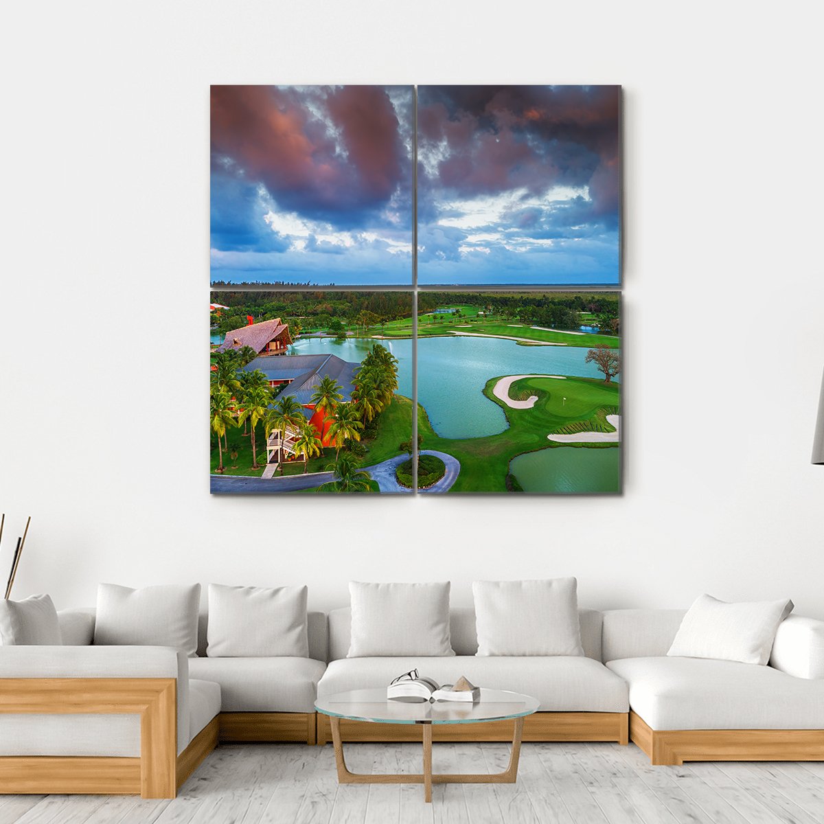 Sunset Tropical Golf Course Aerial View Canvas Wall Art in orange, green and blue, hung on a wall