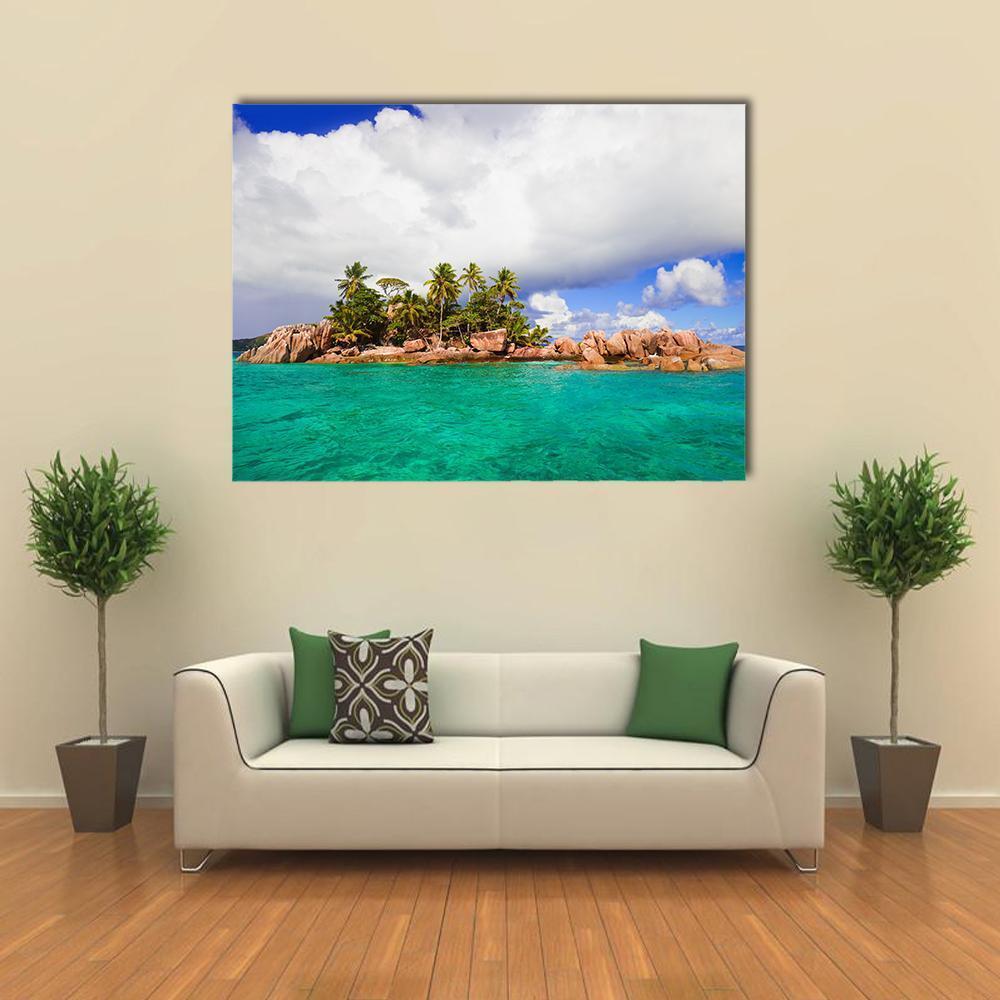 Tropical Island in Seychelles Canvas Wall Art in white, green and blue, single panel hung on a wall
